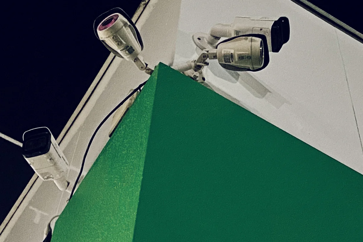 Multiple security cameras installed on a commercial building exterior